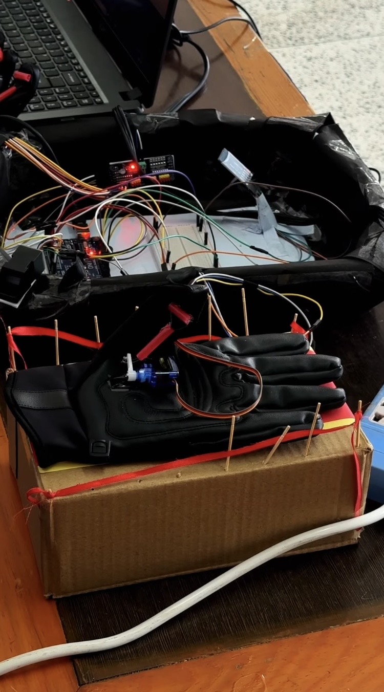Smart Prosthetic Glove prototype on the exhibition table